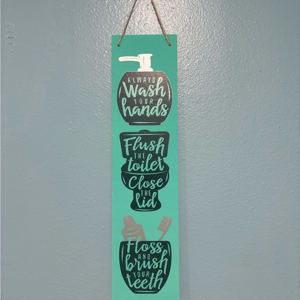 Bathroom hanging sign.